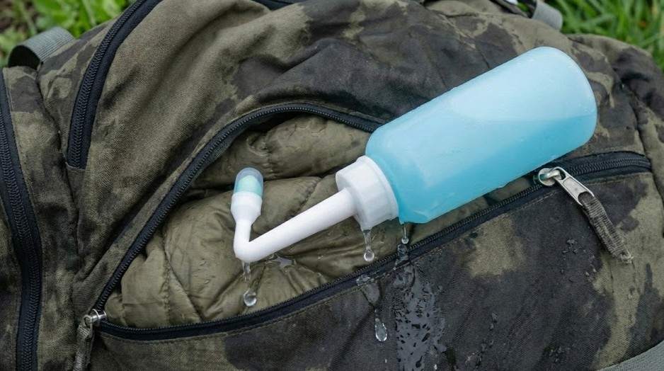 Low-end bidet leaking in a hiking backpack